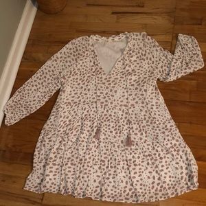 Entro dress, quarter length sleeves, pink and white, tassel detail in front